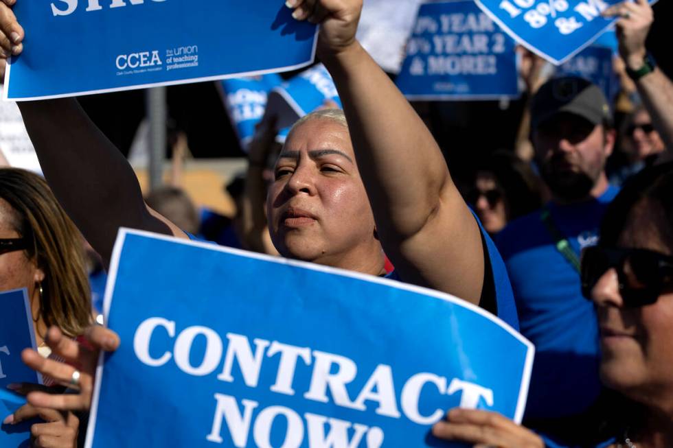 Patricia Glover, a third grade teacher at Kathy L. Batterman Elementary School, protests outsid ...