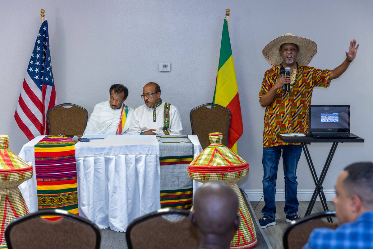 Little Ethiopia Community Center chair Derbew Negash and project chair Girma Zaid speak as Tekl ...