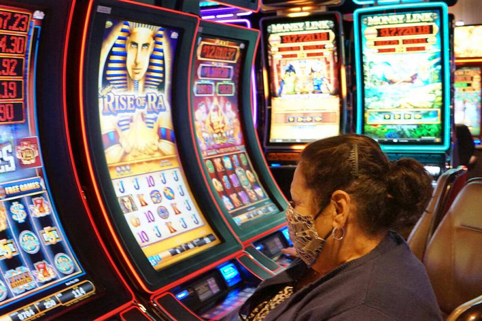 Ramona Trejo plays a slot machine at the Hard Rock Hotel & Casino Lake Tahoe in Stateline, Nev. ...