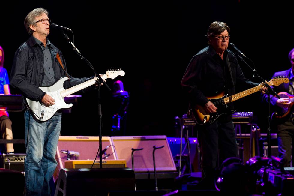 Eric Clapton, left, and Robbie Robertson perform at Eric Clapton's Crossroads Guitar Festival 2 ...