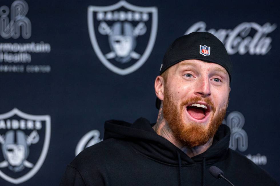 Raiders defensive end Maxx Crosby answers a question during a press conference in training camp ...