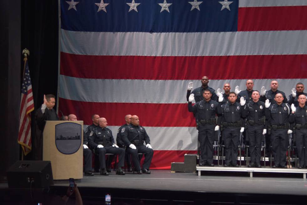 Judge Chris Lee swearing in the new North Las Vegas and CCSD officers at the Horn Theatre at th ...