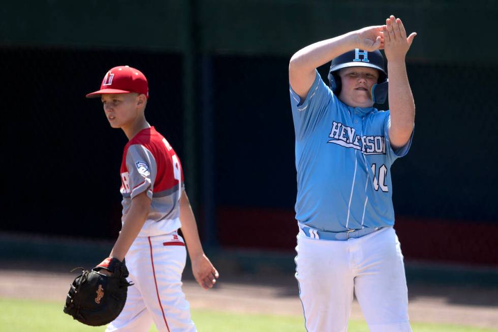 Henderson first baseman Arlie Daniel (10) celebrates after getting on base while Utah first bas ...