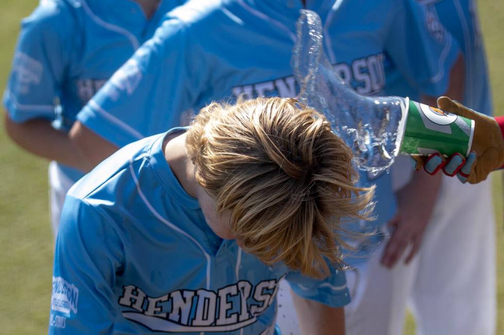 Henderson pitcher Nolan Gifford is showered with water after pitching a no-hitter to Utah in th ...