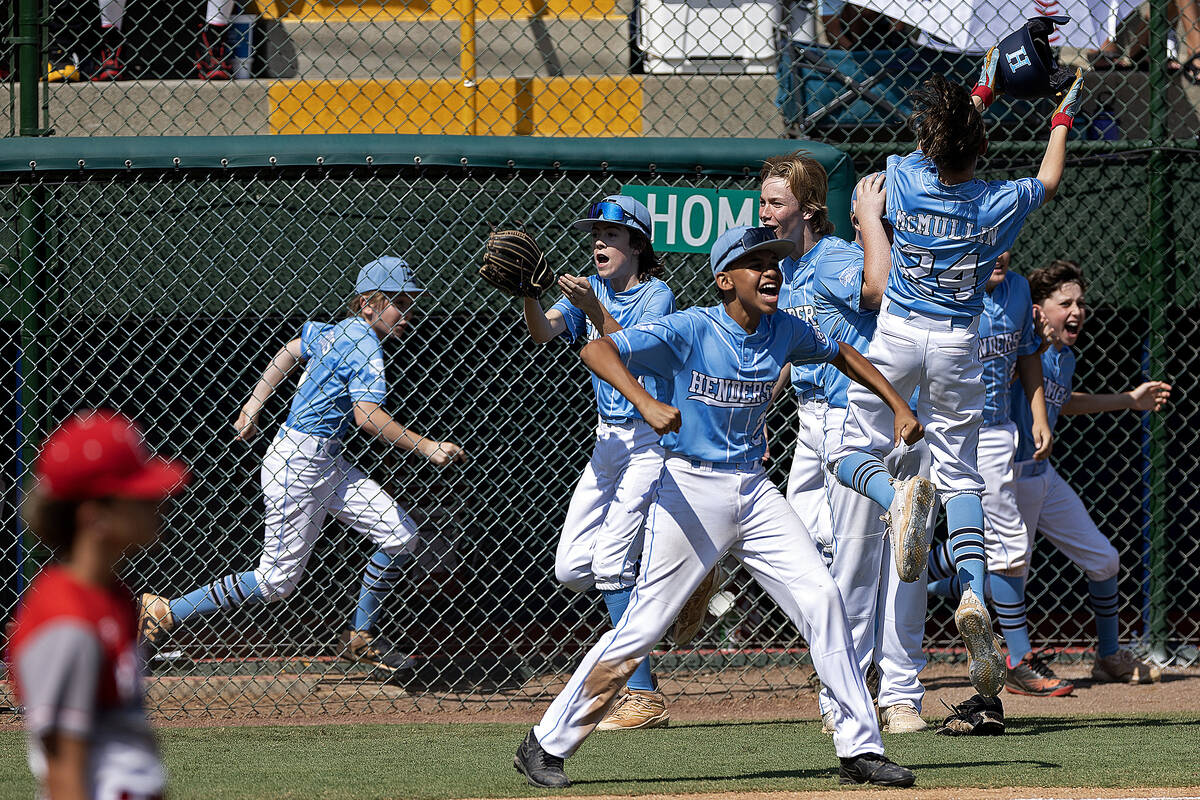 Henderson celebrates after winning the Little League West Regional final baseball game against ...