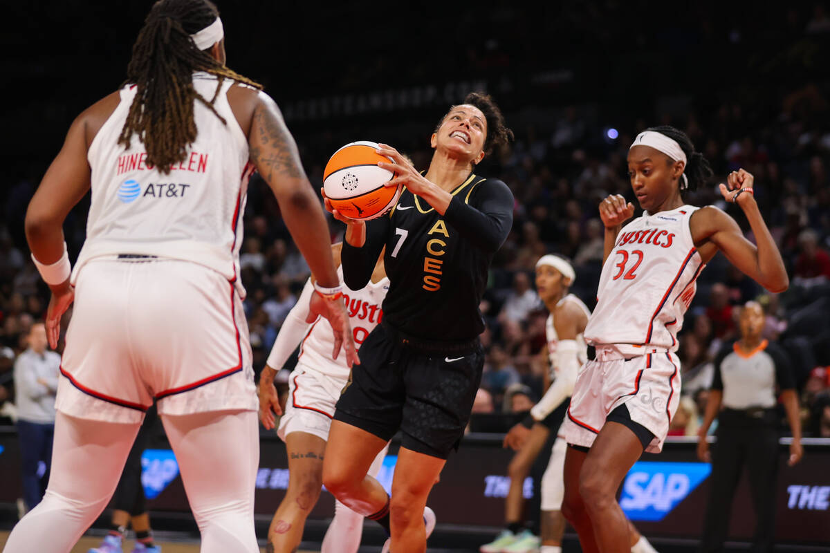 Las Vegas Aces forward Alysha Clark (7) looks up with grit as she prepares to make a layup duri ...