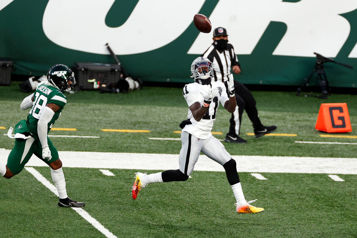 Las Vegas Raiders wide receiver Henry Ruggs III (11) catches the game winning touchdown pass in ...