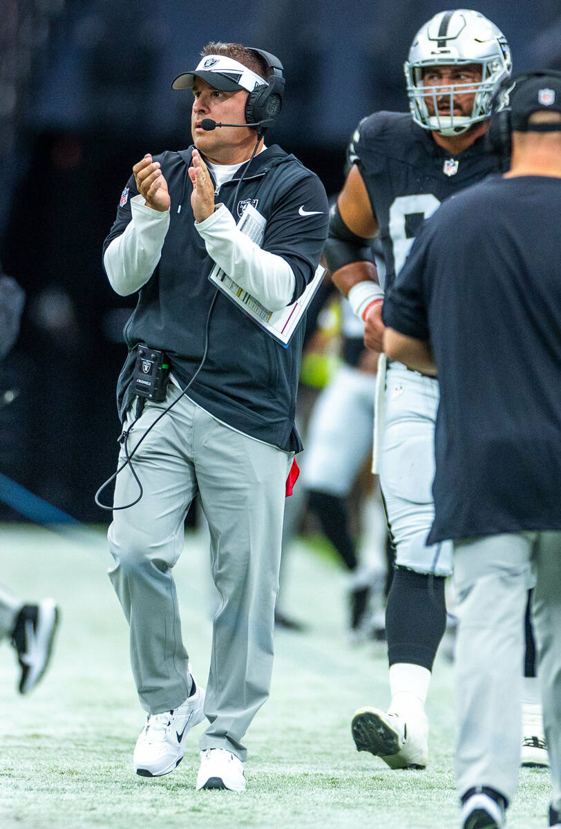 Raiders head coach Josh McDaniels celebrates a touchdown over the San Francisco 49ers during th ...