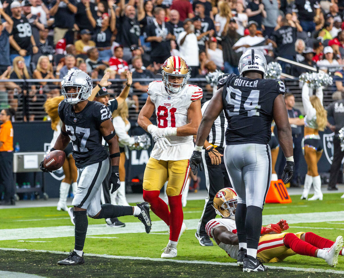 Raiders cornerback Sam Webb (27) nearly scores after an interception and run back against the S ...