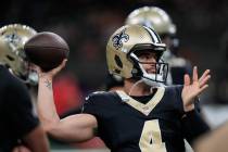 New Orleans Saints quarterback Derek Carr (4) warms up before a preseason NFL football game aga ...