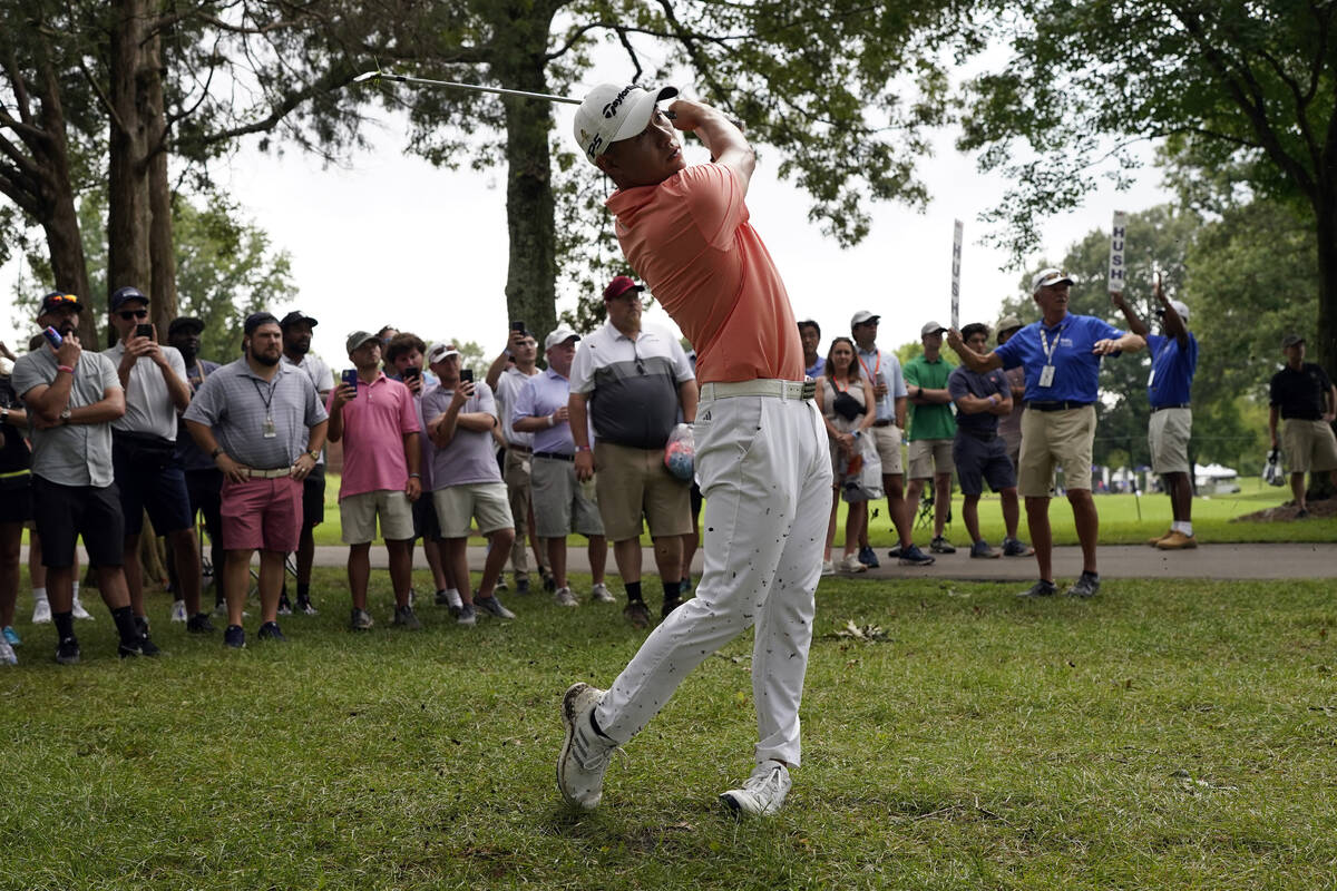 Collin Morikawa hits from the rough on the ninth green during the first round of the St. Jude C ...