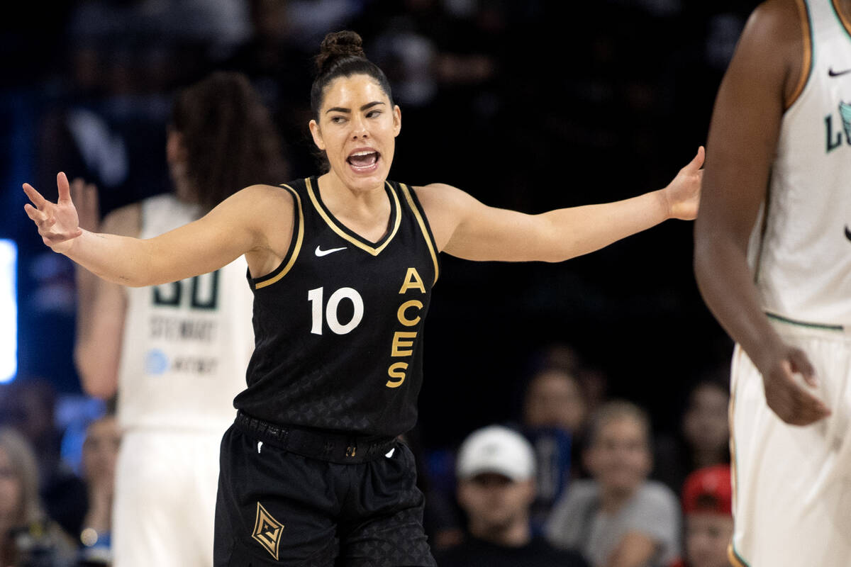Las Vegas Aces guard Kelsey Plum (10) reacts after referees didn’t call a foul when she ...