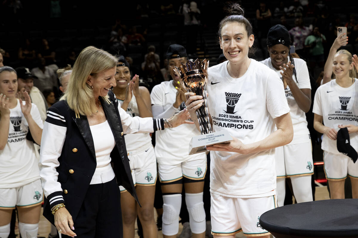 New York Liberty forward Breanna Stewart accepts the Commissioner’s Cup trophy from WNBA ...