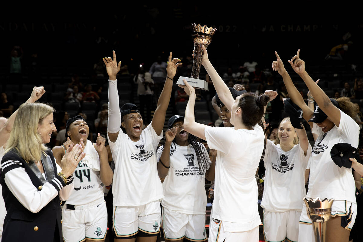 New York Liberty forward Breanna Stewart and her team cheer with the Commissioner’s Cup ...