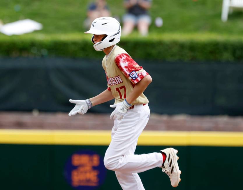 The Henderson All-Stars centerfielder Jaxson McMullen runs bases after hitting a homer against ...