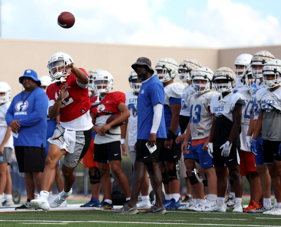 Bishop Gorman's starting quarterback Micah Alejado passes during football practice at Bishop Go ...