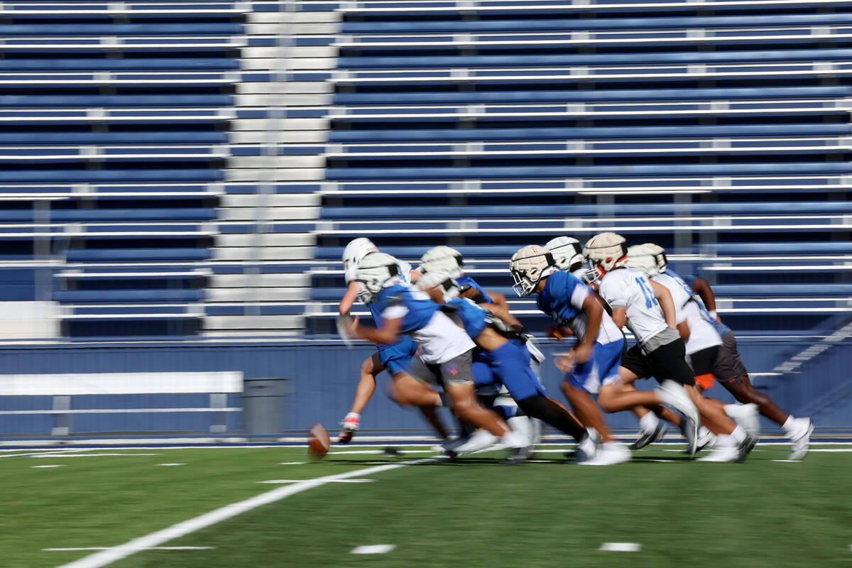 Bishop Gorman runs offensive drills during football practice at Bishop Gorman High School on We ...