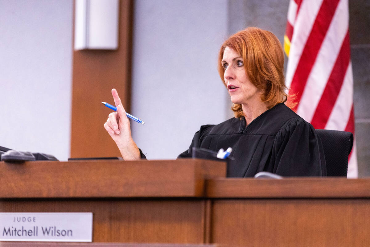 Justice of the Peace Amy Wilson speaks to a defendant in her courtroom at the Regional Justice ...