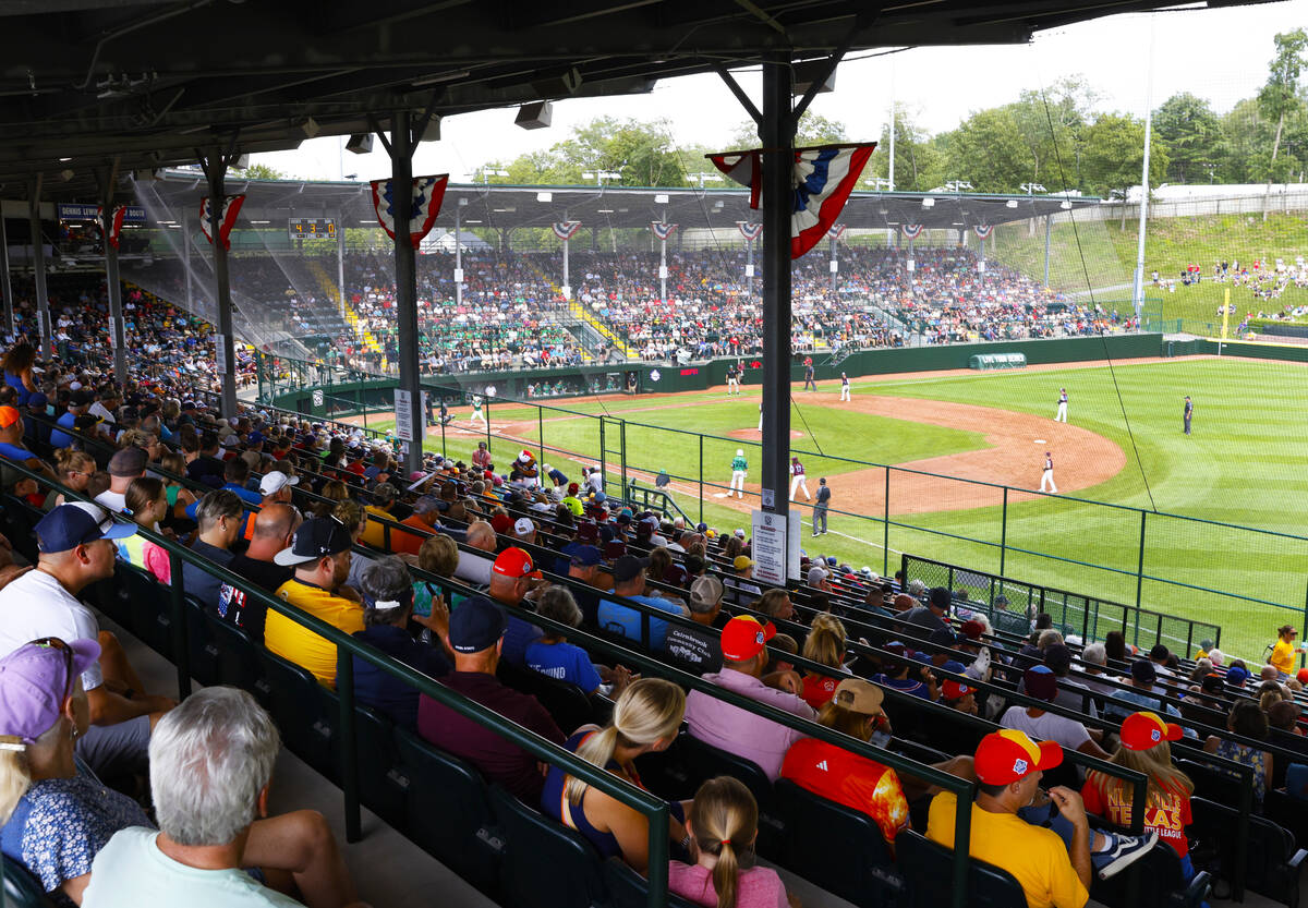 Fans watch a baseball game at Howard J. Lamade Stadium during the Little League World Series to ...