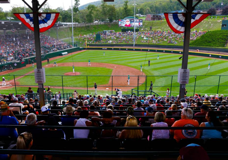 Fans watch a baseball game at Howard J. Lamade Stadium during the Little League World Series to ...