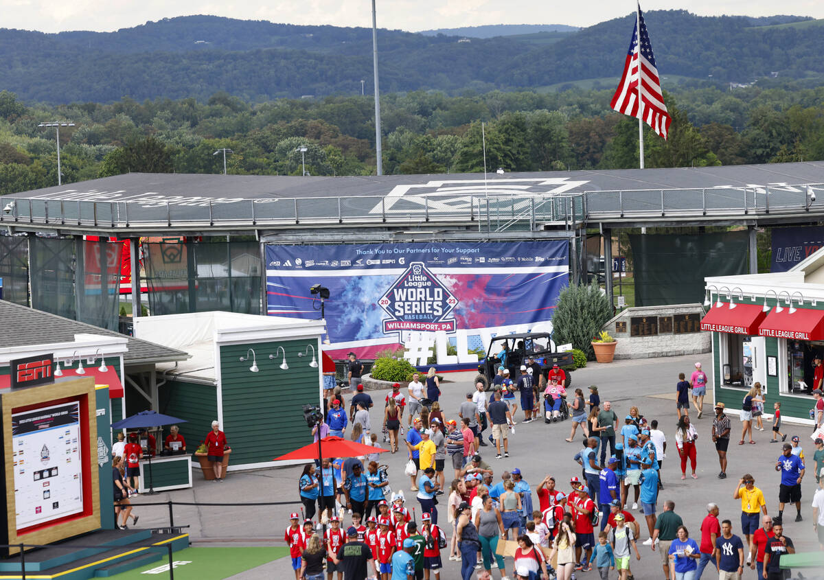 Fans and players arrive at Howard J. Lamade Stadium where the Little League World Series tourna ...