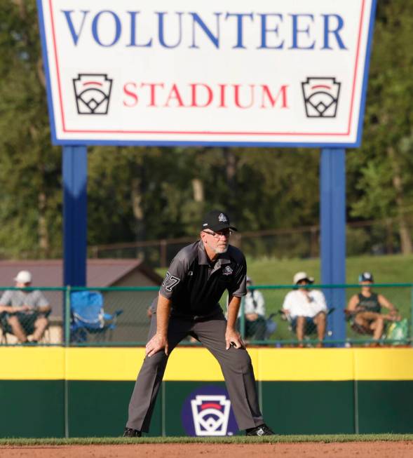 Second base umpire Ben Sprague of Las Vegas watches play during the Little League World Series ...