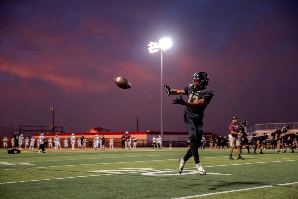 Faith Lutheran warms up before their high school football game against Palo Verde at Faith Luth ...