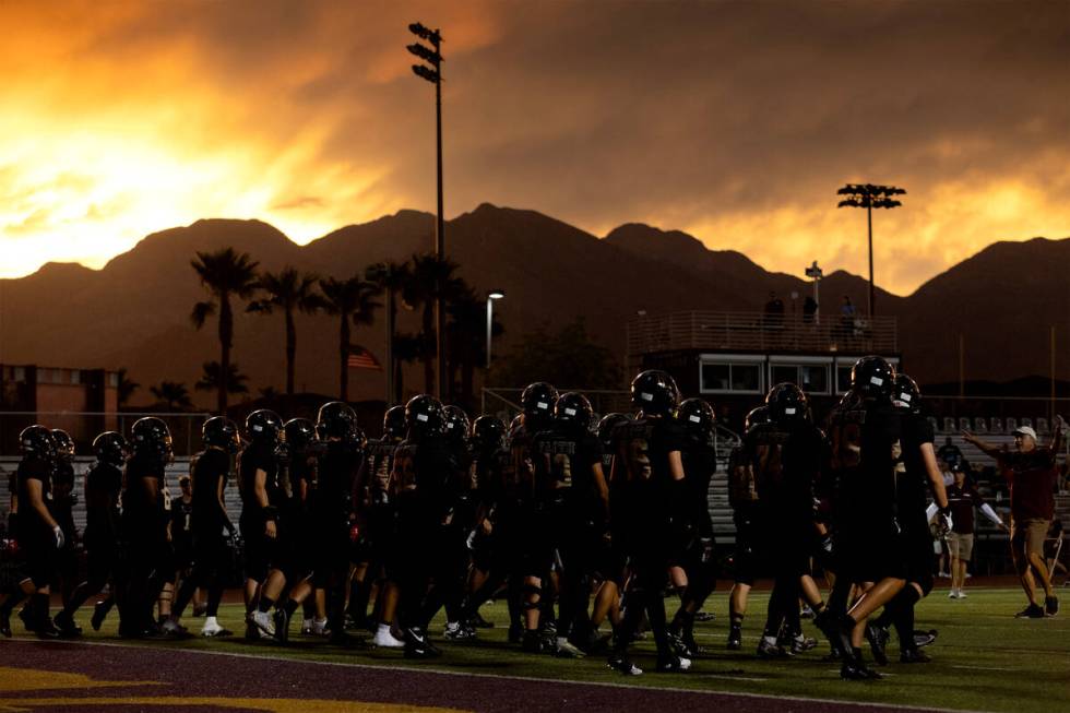 Faith Lutheran warms up before their high school football game against Palo Verde at Faith Luth ...