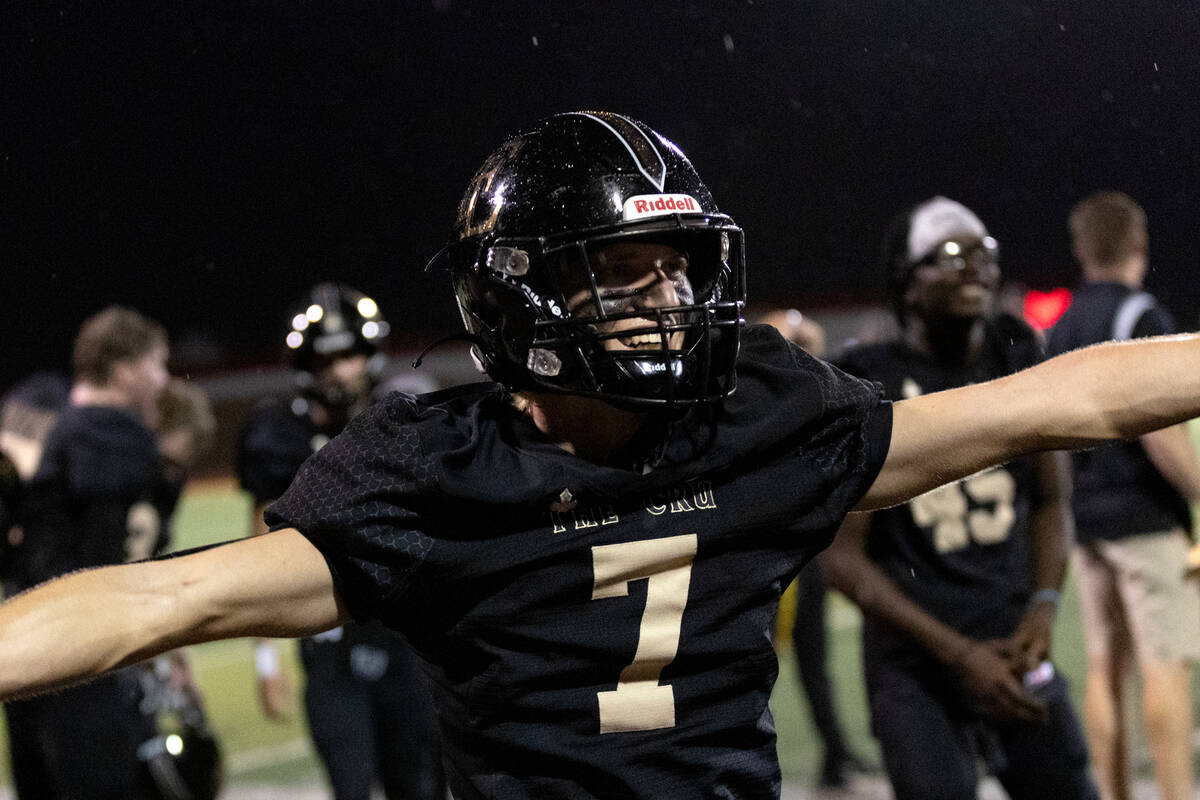 Faith Lutheran wide receiver Mason Aday (7), who scored the game-tying touchdown, celebrates af ...