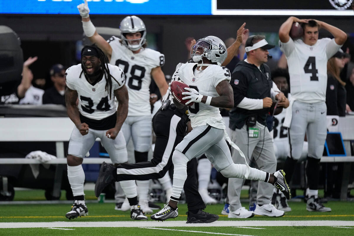 Las Vegas Raiders wide receiver DeAndre Carter reacts after stepping out of bounds during the f ...