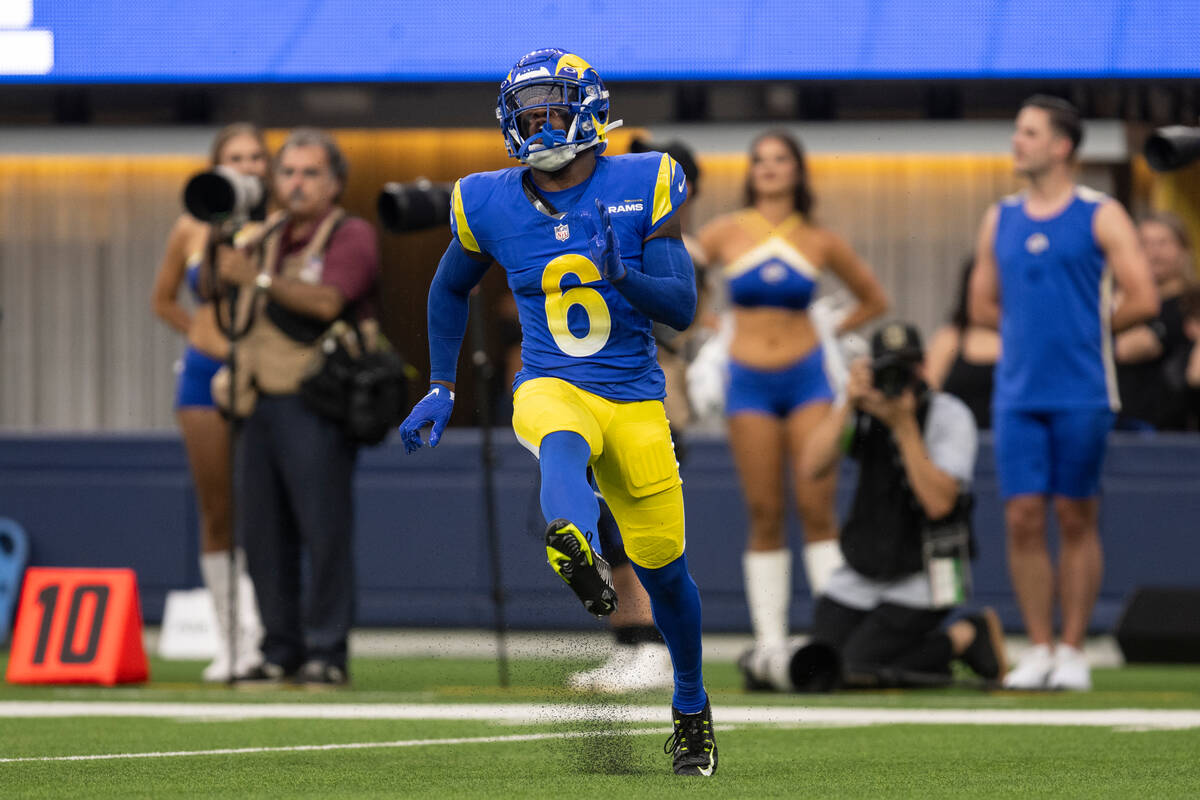 Los Angeles Rams cornerback Tre Tomlinson (6) reacts after stopping a pass during an NFL presea ...