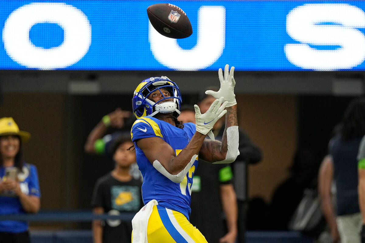 Los Angeles Rams wide receiver Demarcus Robinson makes a catch during warmups before a preseaso ...