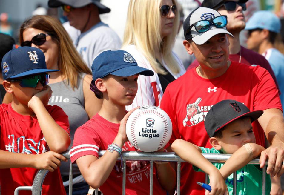 Fans wait for Phillies and Washington Nationals players to arrive at of Howard J. Lamade Stadiu ...