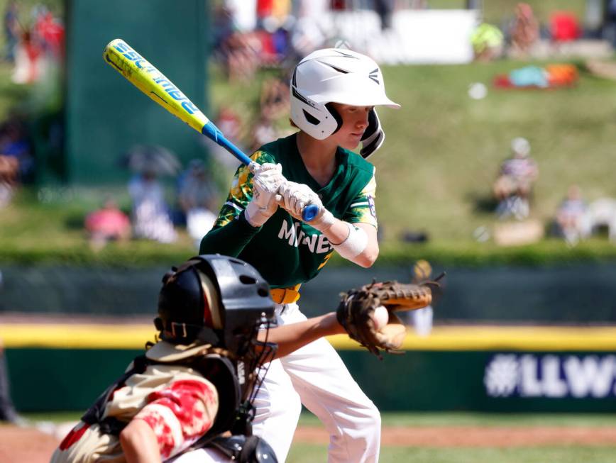 Fargo, North Dakota's left fielder Colin Hanson struck out looking by Henderson All-Stars pitch ...