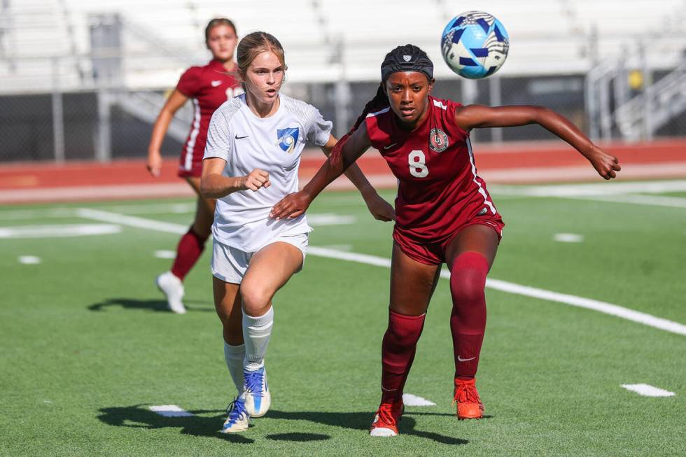 Desert Oasis’ Lillian Felise (8) and Foothill’s Savanna Truax (3) chase down the ball durin ...