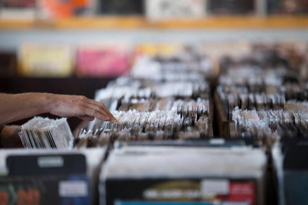 A customer browses the vinyl records at 11th Street Records on Nov. 25, 2017, in downtown Las V ...
