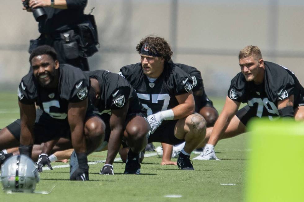 Raiders linebacker Drake Thomas (57) stretches during their mandatory minicamp at the Intermoun ...