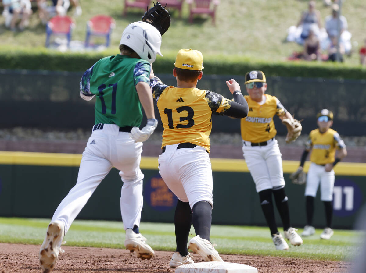 Seattle, Washington, pitcher Trey Kirchoff (17) forced out by Nolensville, Tennessee third base ...