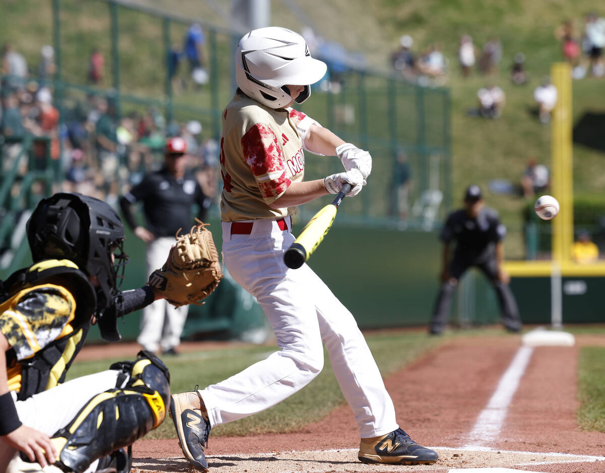 The Henderson All-Stars Truman Morris connects against Nolensville, Tennessee, during the Littl ...