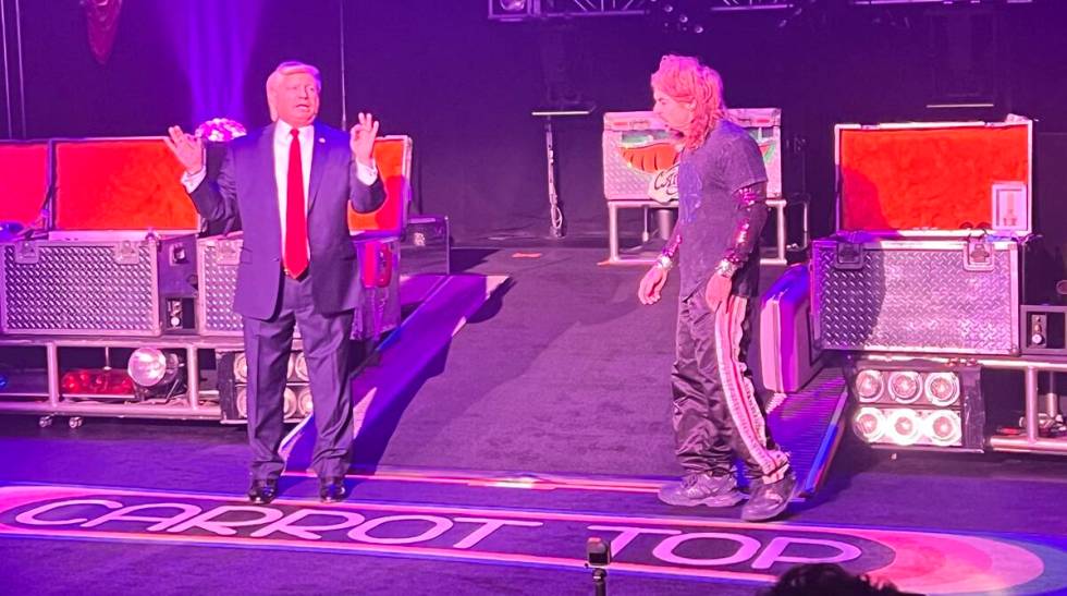 John Di Domenico as Donald Trump is shown with Carrot Top at Luxor's Atrium Showroom on Monday, ...