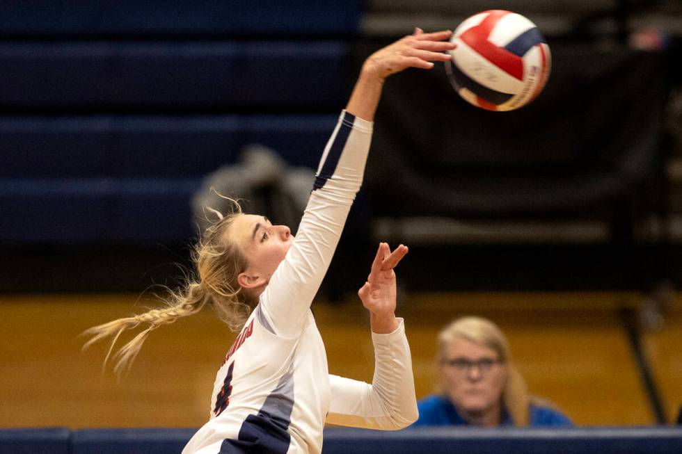 Coronado’s Gentry Oblad (4) spikes to Silverado during a high school volleyball game at ...