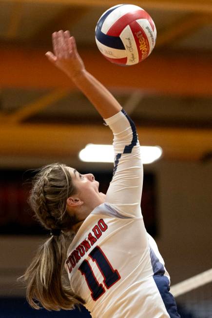 Coronado’s Reagan Vint (11) spikes to Silverado during a high school volleyball game at ...