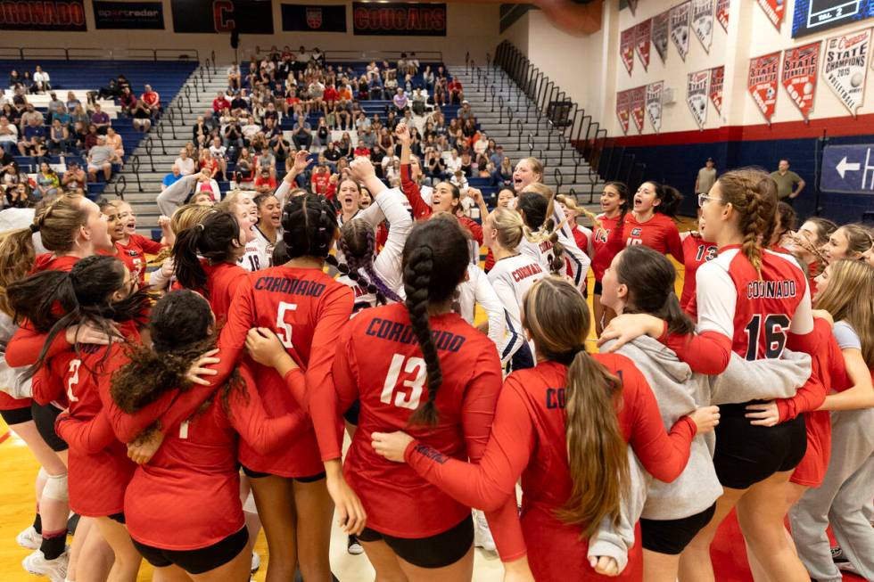 Coronado cheers before beginning their a high school volleyball game against Silverado at Coron ...