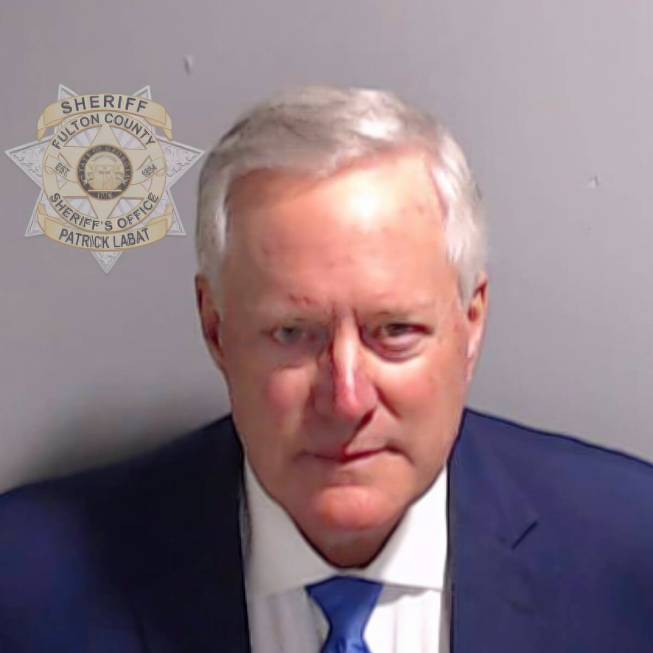 This booking photo provided by the Fulton County Sheriff's Office shows Mark Meadows on Thursda ...