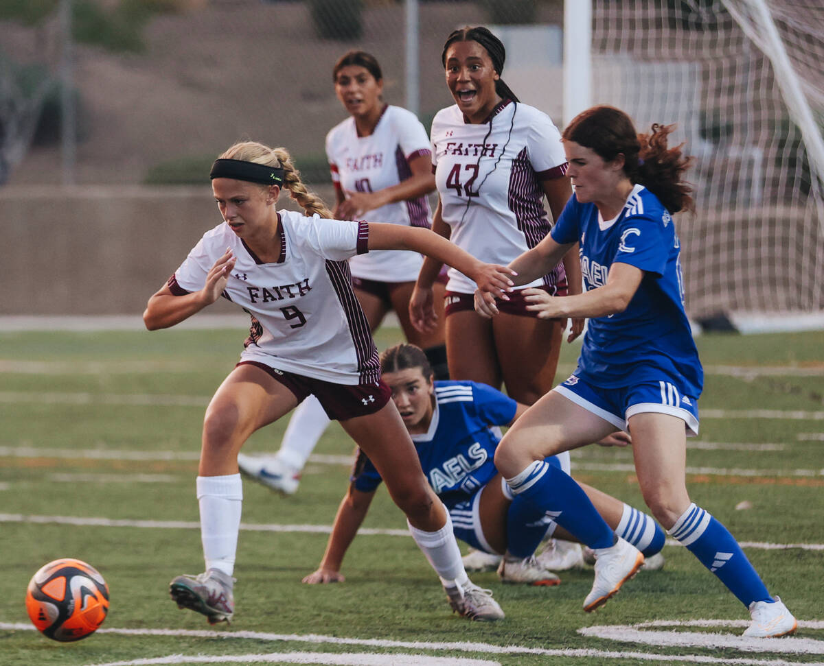 Faith Lutheran midfielder Gloria Vancura (9) runs after the ball during a game against Bishop G ...