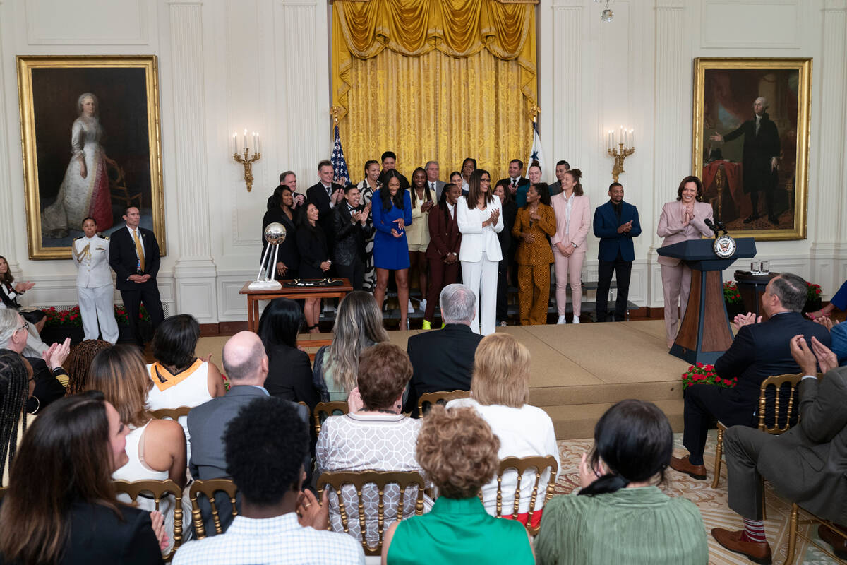 Vice President Kamala Harris is applauded as she speaks during a ceremony in the East Room welc ...