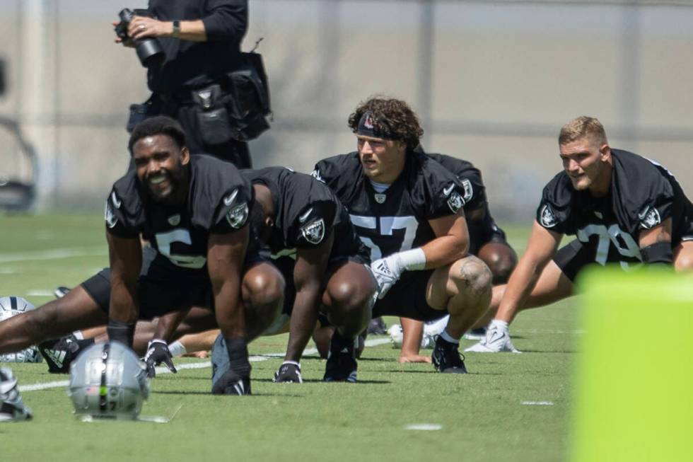 Raiders linebacker Drake Thomas (57) stretches during their mandatory minicamp at the Intermoun ...