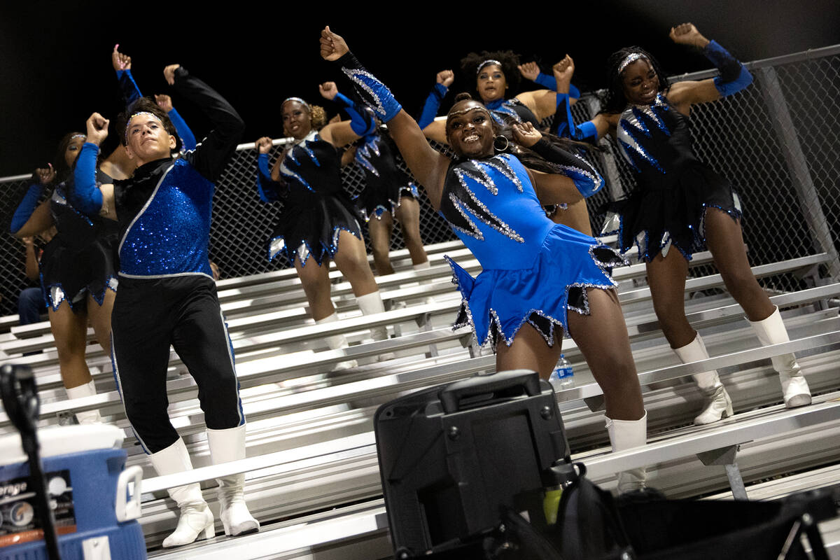 The Desert Pines majorettes dance as their team is winning during the second half of a high sch ...