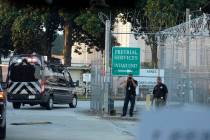 The motorcade of former President Donald Trump arrives at the Fulton County Jail, Thursday, Aug ...