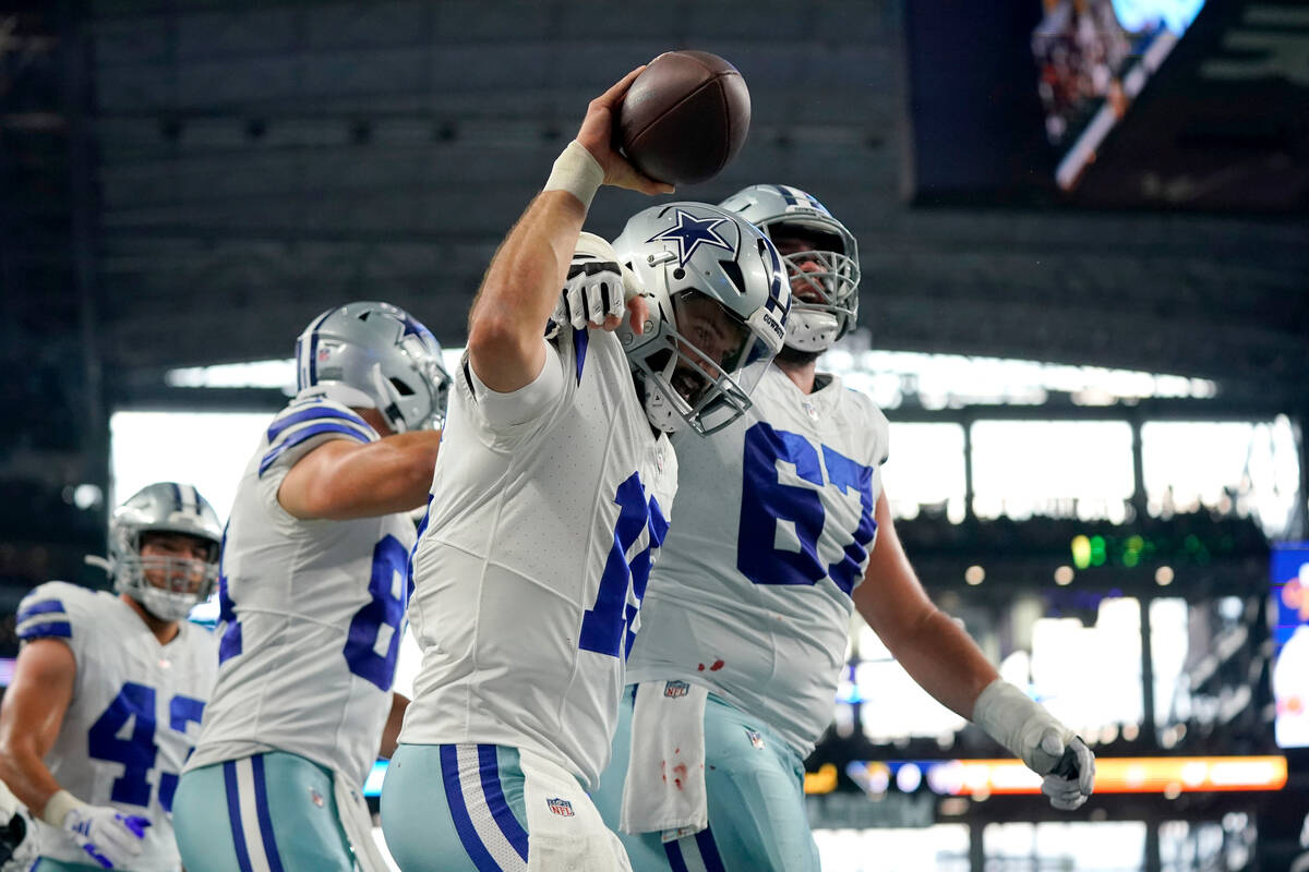 Dallas Cowboys running back Hunter Luepke sprints to the end zone, scoring a touchdown in the f ...